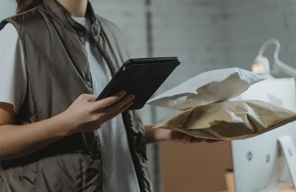 Manager checking inventory and sales in an ERP system