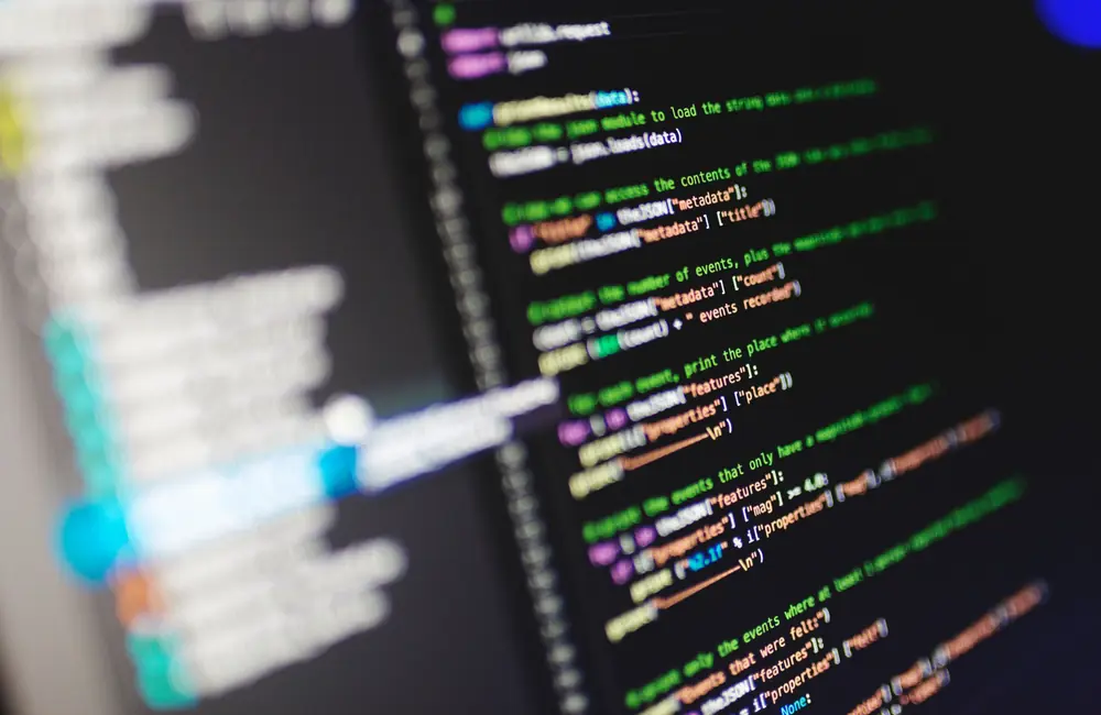 Programmer connecting business systems through APIs